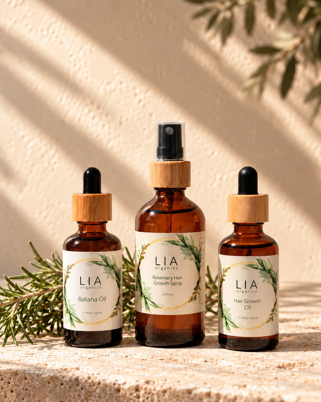Lia Organics Batana Oil, Rosemary Tonic and Hair Oil in a sunlit setting