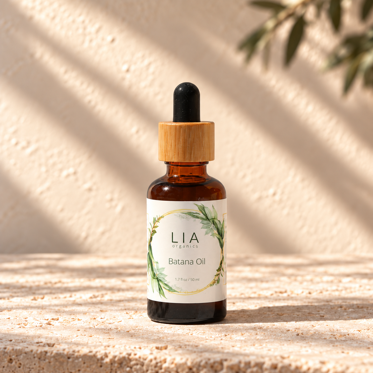 LIA Organics Batana Oil, 50 ml, with bamboo-collar dropper.